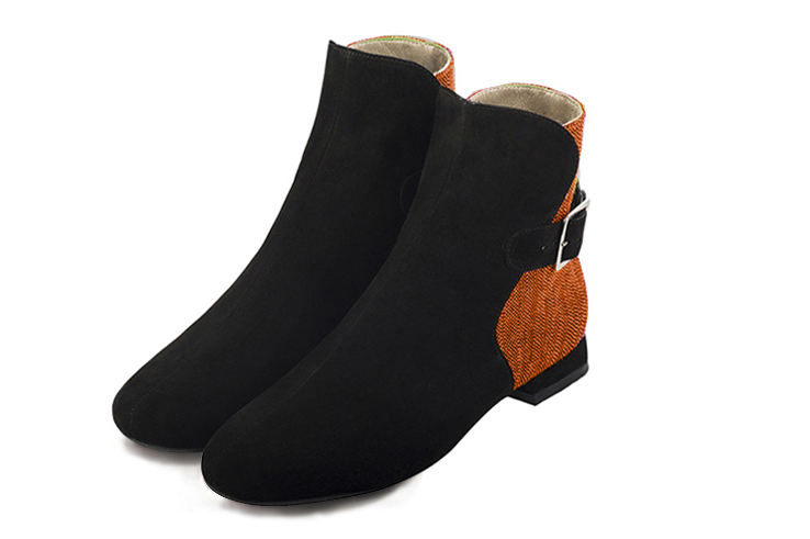 Matt black and clementine orange women's ankle boots with buckles at the back. Round toe. Flat block heels. Front view - Florence KOOIJMAN